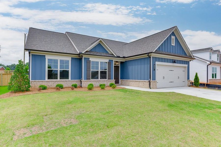 Front exterior of a new home in , Jefferson, GA, highlighting curb appeal (Image 23).
