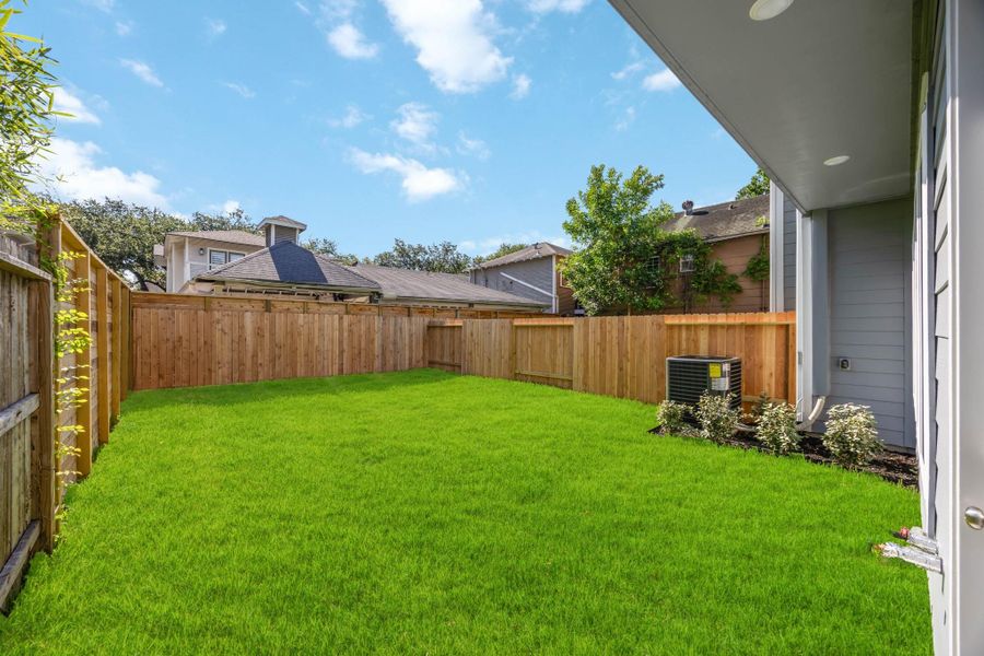 Your Own Green Escape: A fully fenced, generously sized backyard with lush sod and open sky — the private outdoor space you've been looking for, right in the heart of the city. Your Own Green Escape: A fully fenced, generously sized backyard with lush sod and open sky — the private outdoor space you've been looking for, right in the heart of the city.