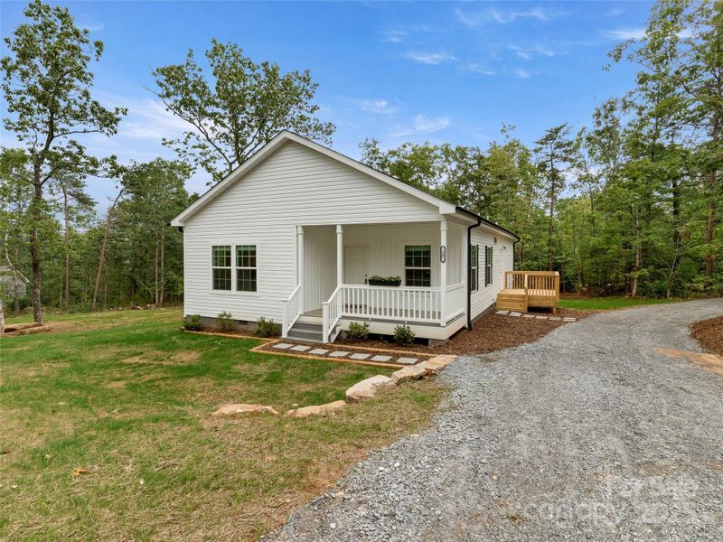 Front exterior of a new home in , Hendersonville, NC, highlighting curb appeal (Image 15).