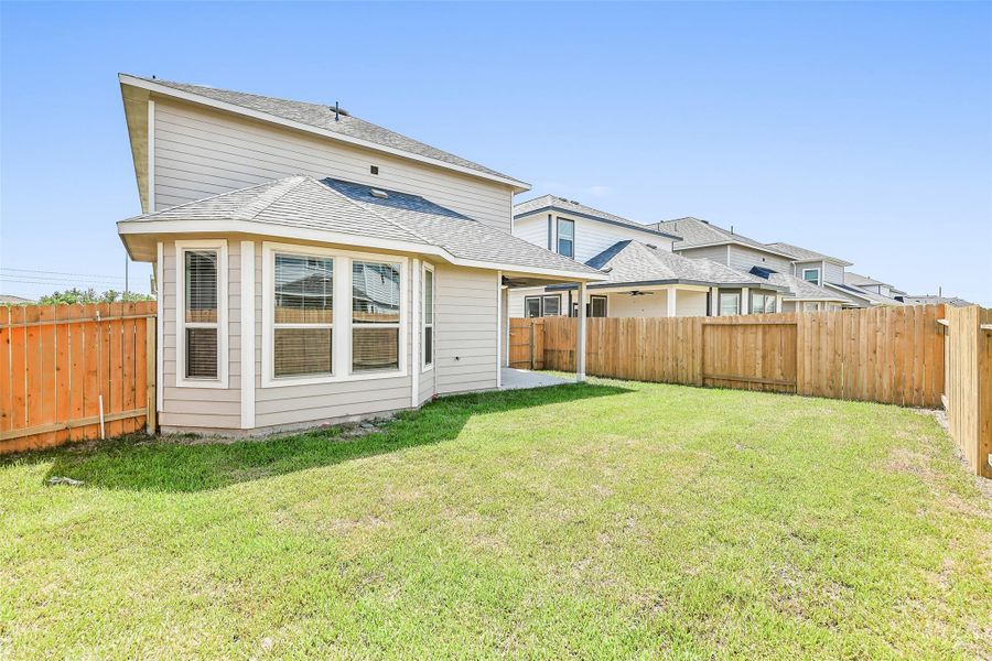 Front exterior of a new home in Anderson Lakes, Houston, TX, highlighting curb appeal (Image 1). Front exterior of a new home in Anderson Lakes, Houston, TX, highlighting curb appeal (Image 1).