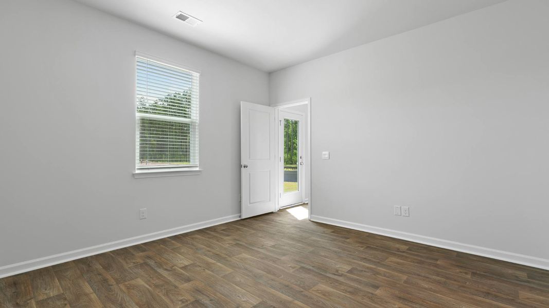 Spacious, unfurnished interior of a new home in Pine Hills at Cane Bay, Summerville (Image 12). Spacious, unfurnished interior of a new home in Pine Hills at Cane Bay, Summerville (Image 12).