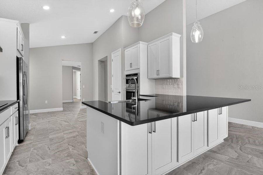 Furnished interior view inside a new home in Colbert Landings, Palm Coast (Image 6).