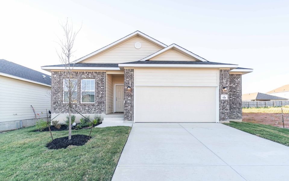 Front exterior of a new home in Cloud Country, New Braunfels, TX, highlighting curb appeal (Image 2).