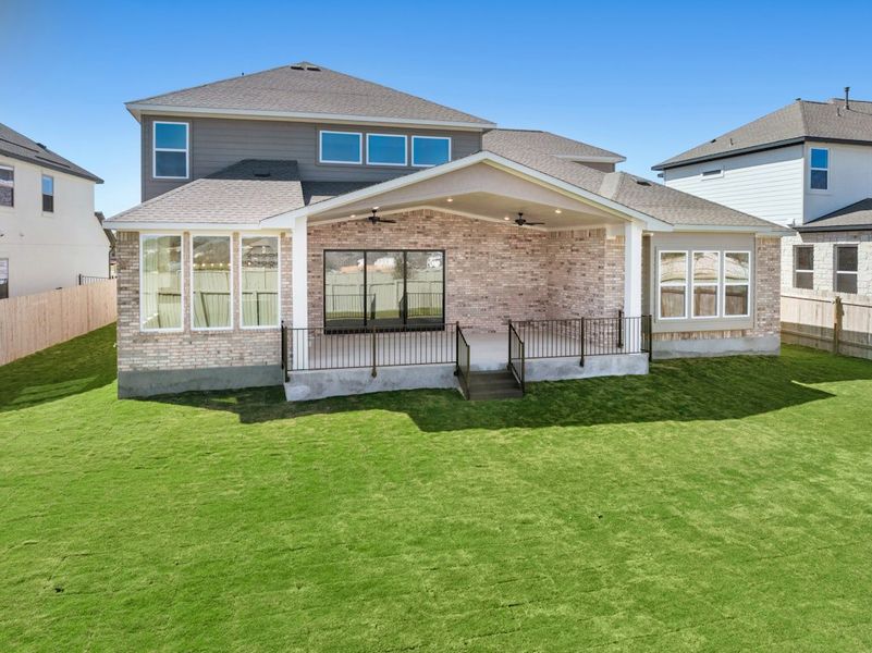 Exterior details and patio area of a home in Santa Rita Ranch, Liberty Hill (Image 3).
