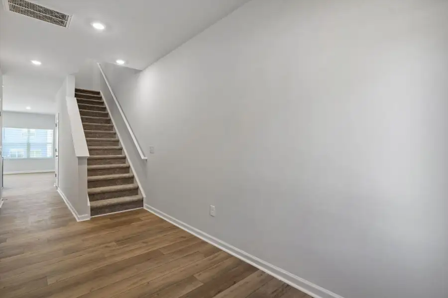 Spacious, unfurnished interior of a new home in West Main Townhomes, Sanford (Image 12).