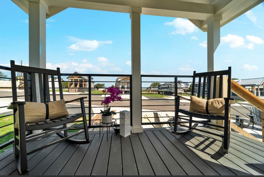 Relax and enjoy exceptional Hill Country views with two balconies (one on each end)!
