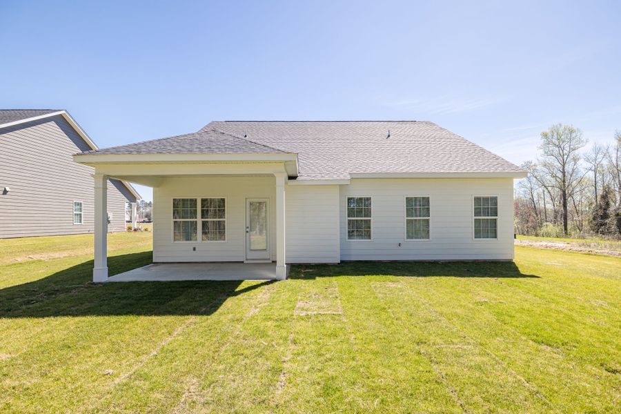 Front exterior of a new home in Millbrook, Thomson, GA, highlighting curb appeal (Image 25). Front exterior of a new home in Millbrook, Thomson, GA, highlighting curb appeal (Image 25).