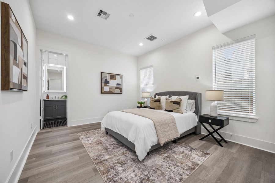 The first floor bedroom is very spacious and can even accommodate a king sized bed. It has a roomy walk in closet and a full bath with a large easily accessible shower. The first floor bedroom is very spacious and can even accommodate a king sized bed. It has a roomy walk in closet and a full bath with a large easily accessible shower.