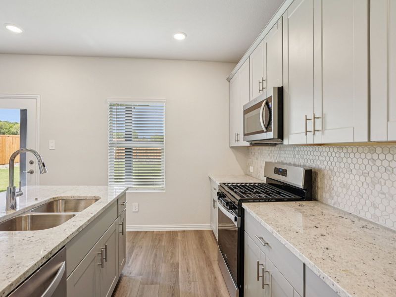 Furnished interior view inside a new home in Westmoor, Sherman (Image 7).
