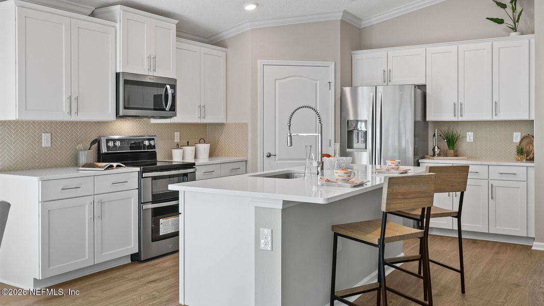 Furnished interior view inside a new home in Sawmill Branch, Palm Coast (Image 16).