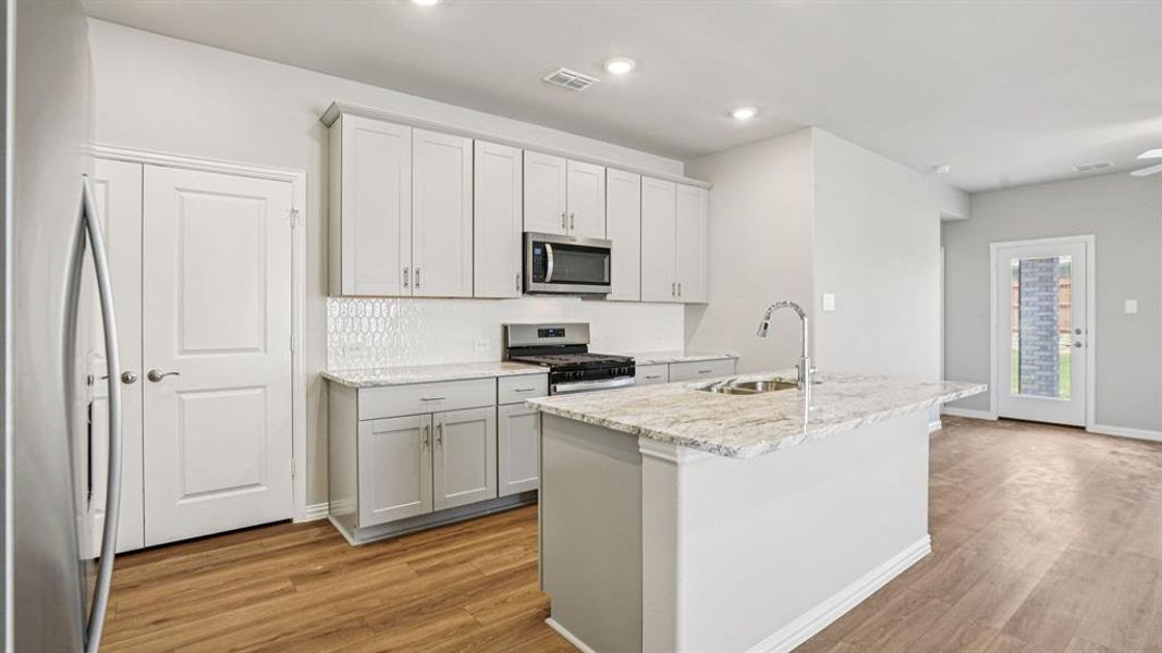 Photo is not of the actual home, but is an inspirational photo of builder’s model home and may depict options, furnishings, and/or decorator features that are not included.