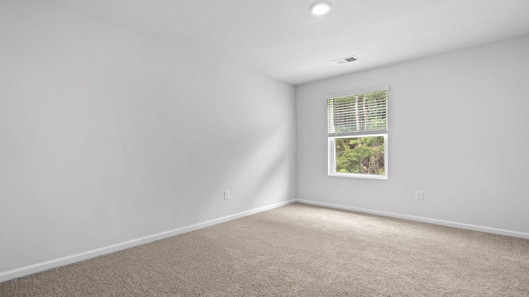 Spacious, unfurnished interior of a new home in The Retreat at East Argent, Ridgeland (Image 16).