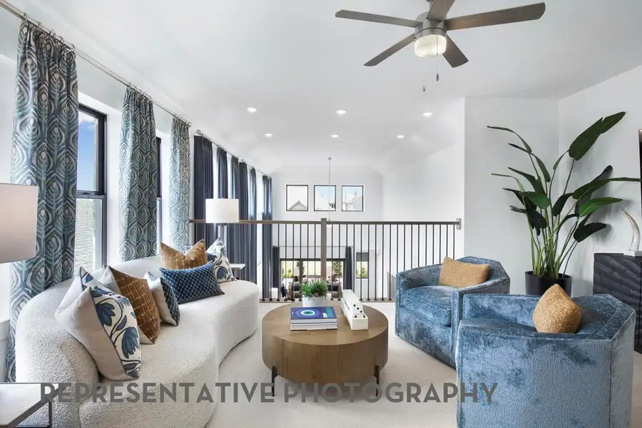 Furnished interior view inside a new home in Bridgeland, Cypress (Image 3).