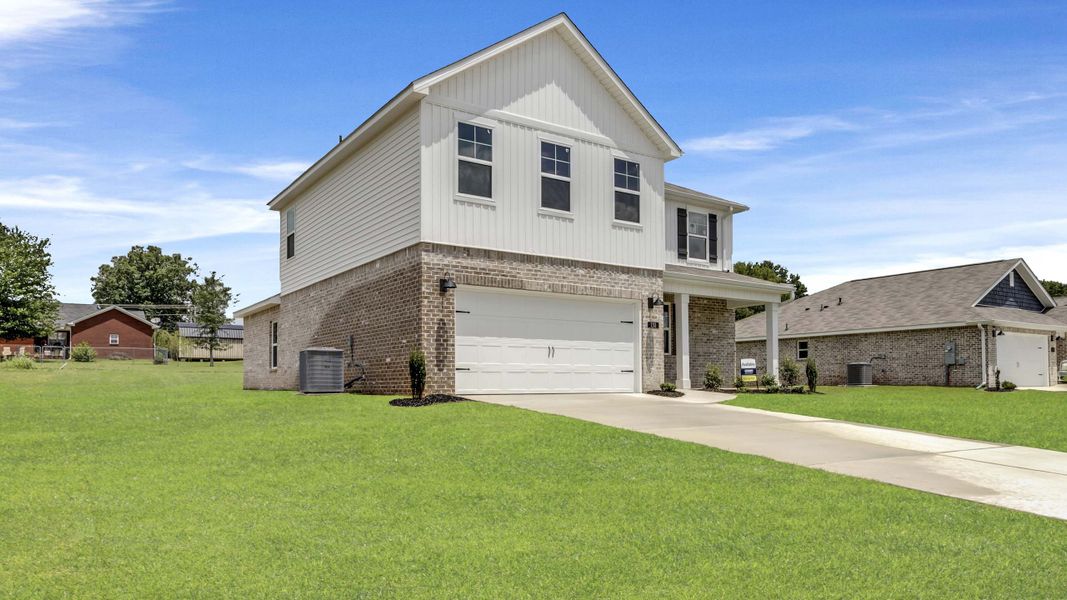 Front exterior of a new home in Bailey Park, Fayetteville, TN, highlighting curb appeal (Image 22).