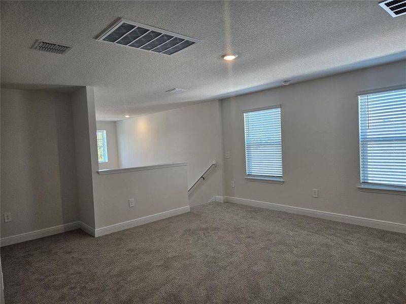 Spacious, unfurnished interior of a new home in The Reserve at Hammock Oaks - Classic Series, Lady Lake (Image 31).