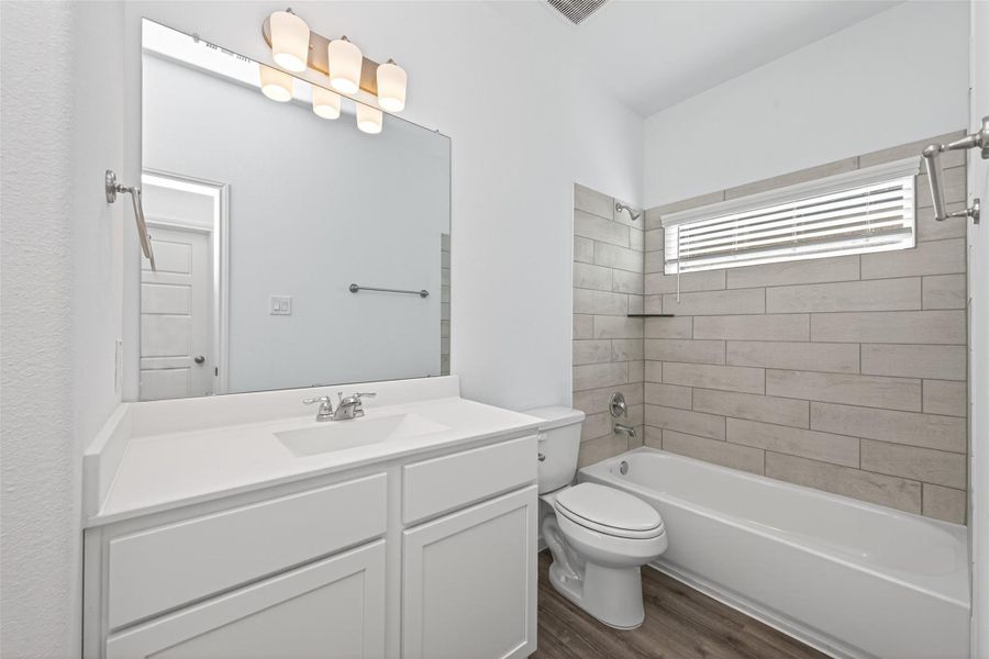 Furnished interior view inside a new home in Enclave at Willis, Willis (Image 14).