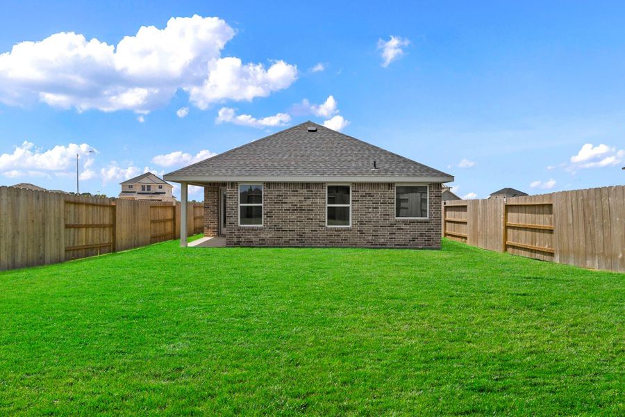 Exterior details and patio area of a home in Cypress Green, Tomball (Image 3).