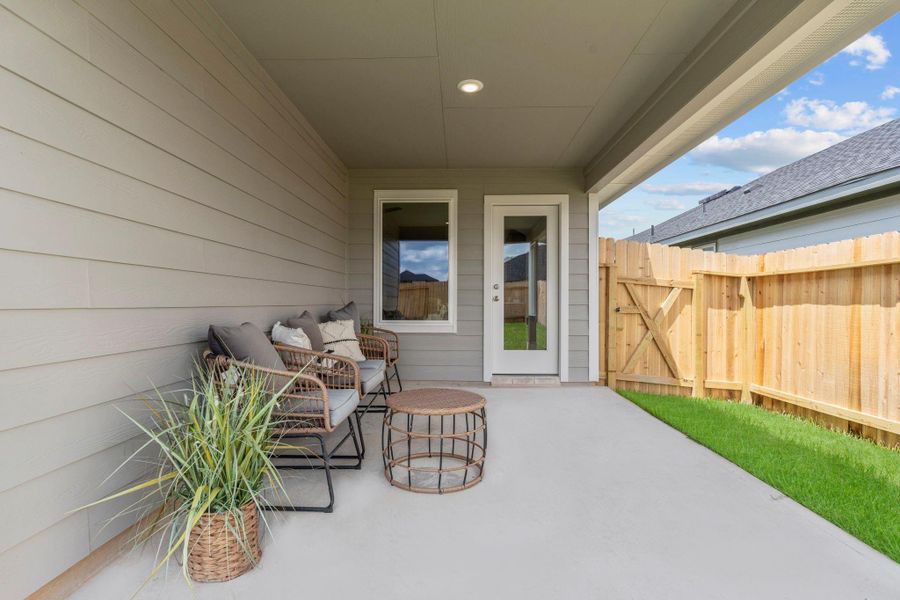 Exterior details and patio area of a home in Emberly, Beasley (Image 3).