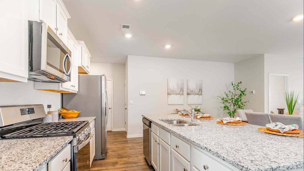 Furnished interior view inside a new home in The Bluffs at Mill Creek, Florence (Image 6).