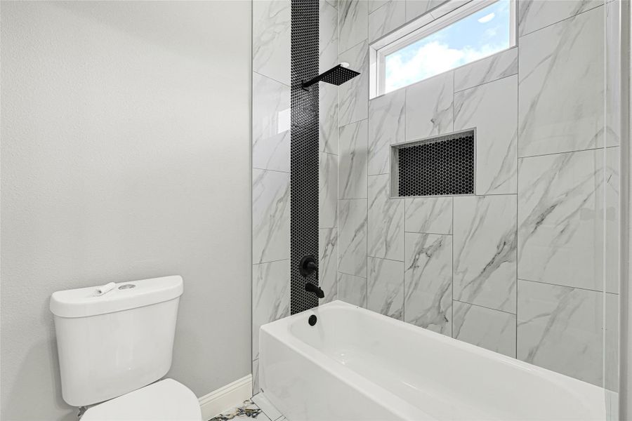 Check out the detail on tiled shower walls. Check out the detail on tiled shower walls.