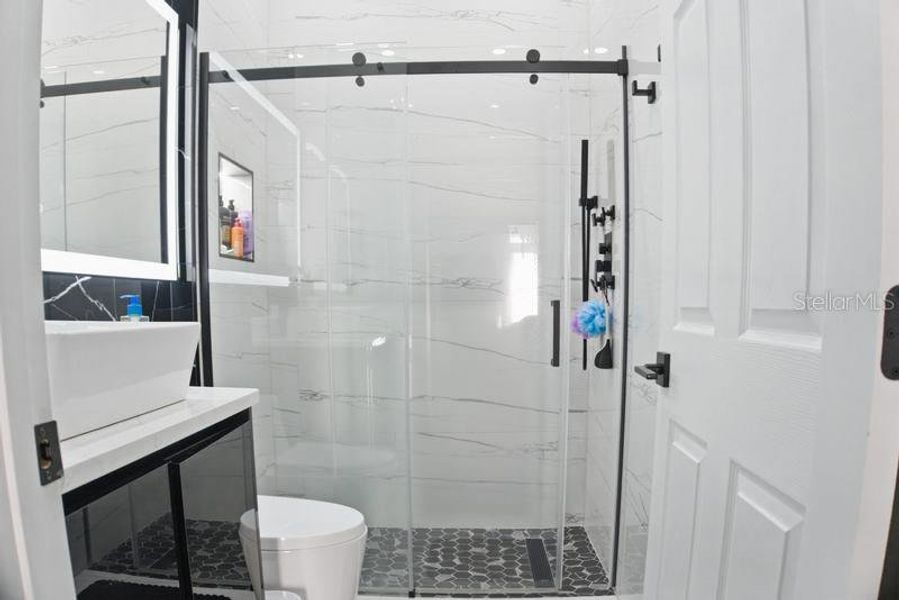 Furnished interior view inside a new home in Storey Creek, Kissimmee (Image 6).