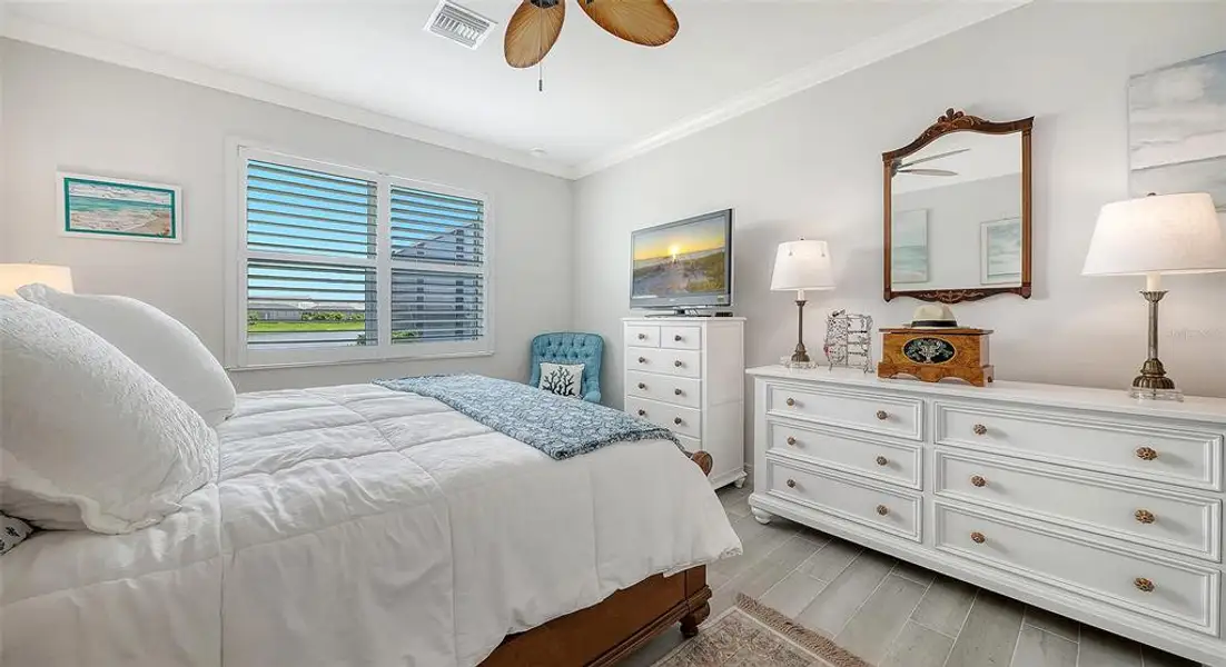 Furnished interior view inside a new home in LakeHouse Cove at Waterside, Sarasota (Image 8). Furnished interior view inside a new home in LakeHouse Cove at Waterside, Sarasota (Image 8).