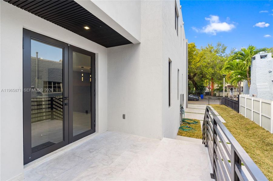 Exterior details and patio area of a home in , Miami (Image 29).