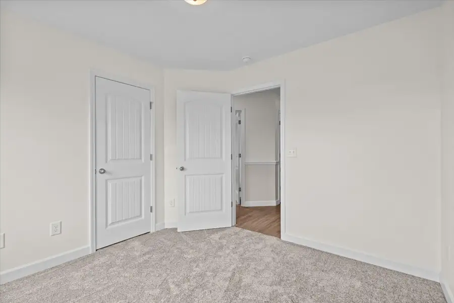 Representative unfurnished interior of a home built from the Drayton by Enchanted Homes in Lonesome Dove, San Antonio (Image 26).