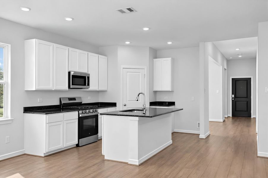 Furnished interior view inside a new home in Raburn Reserve 50s, Tomball (Image 3).