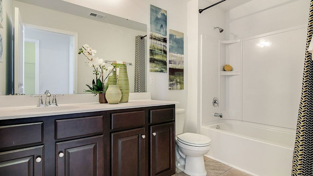 Representative furnished interior of a home built from the Aisle by D.R. Horton in Cobblestone Village, Savannah (Image 20).