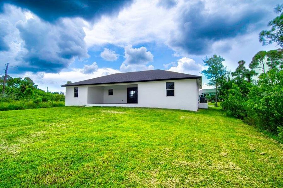 Exterior details and patio area of a home in , Port Charlotte (Image 15).