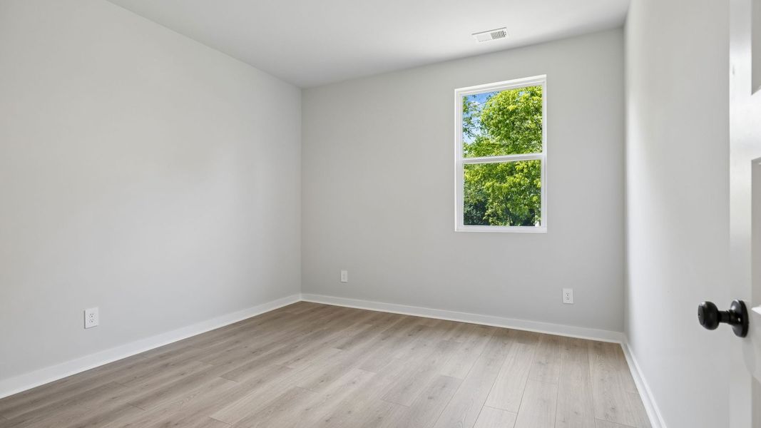 Representative unfurnished interior of a home built from the Ansley by D.R. Horton in Harvest Point, Spring Hill (Image 64).