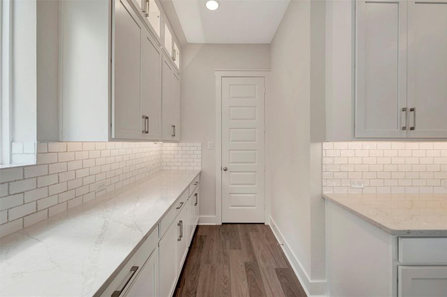 Furnished interior view inside a new home in Elyson 40', Katy (Image 16).