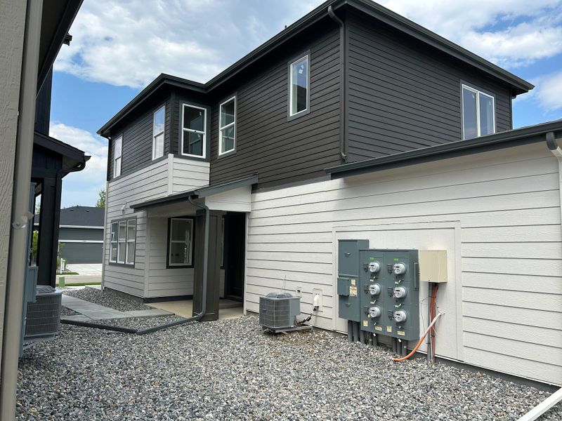 Exterior details and patio area of a home in Westside Crossing, Berthoud (Image 4).