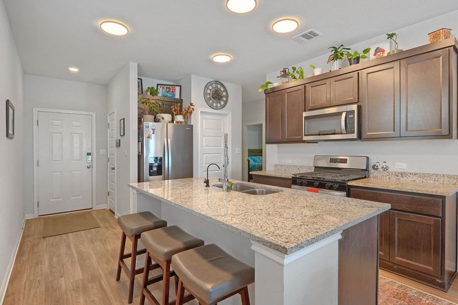 Furnished interior view inside a new home in Stallion Run, Buda (Image 10).