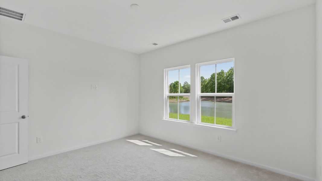 Furnished interior view inside a new home in Bluffs at Sun Colony, Longs (Image 11).