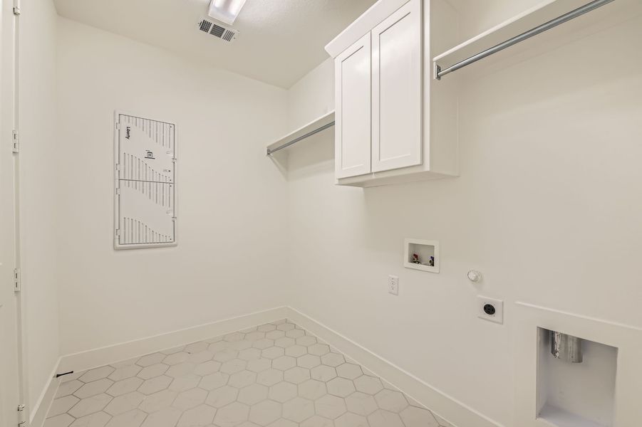 Plan 1566 Laundry Room Representative Photo