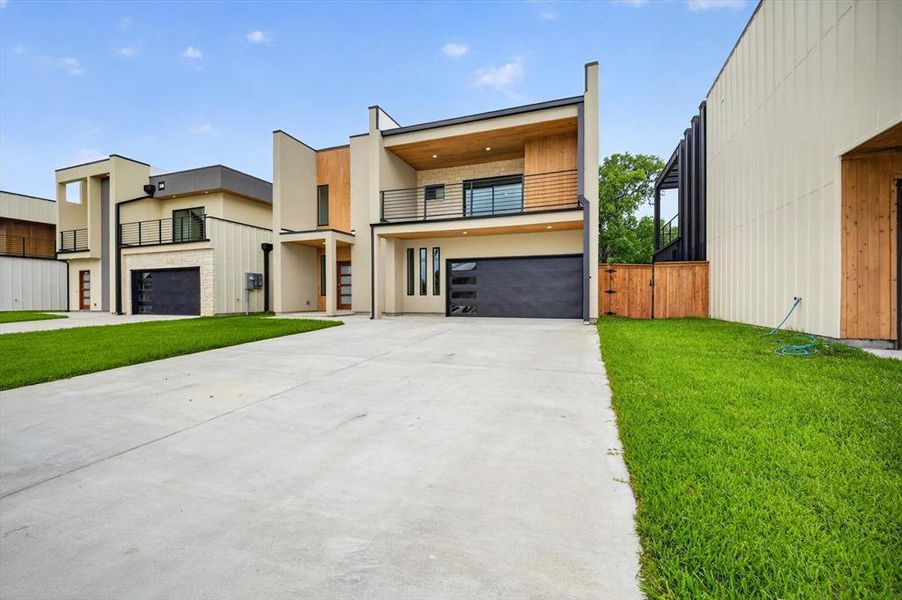 Front exterior of a new home in , Irving, TX, highlighting curb appeal (Image 18).