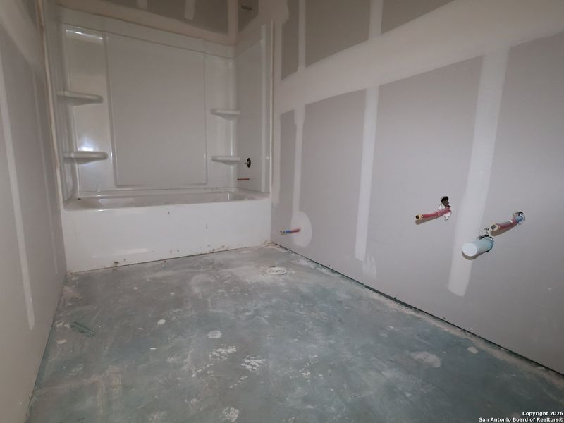 In-progress construction of a new home in Cinco Lakes, San Antonio, TX (Image 22).
