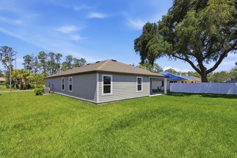 Exterior details and patio area of a home in Palm Coast, Palm Coast (Image 4).