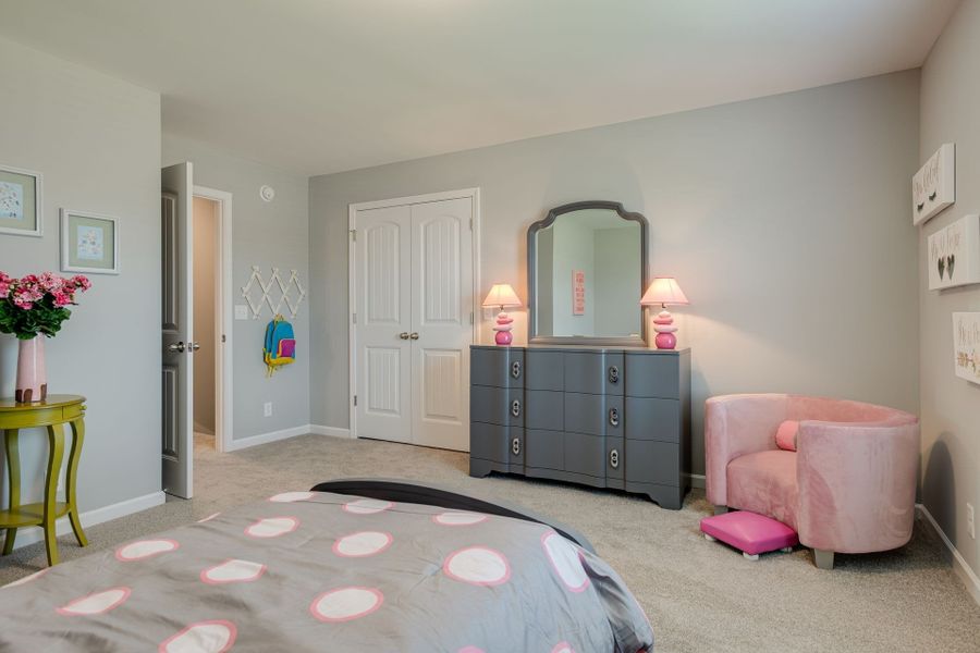 Stock photo of secondary bedroom with large closet