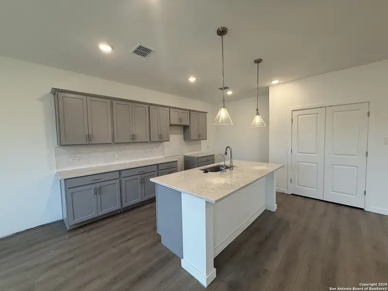 Furnished interior view inside a new home in Meadows at Hennersby Hollow 40's, San Antonio (Image 8).