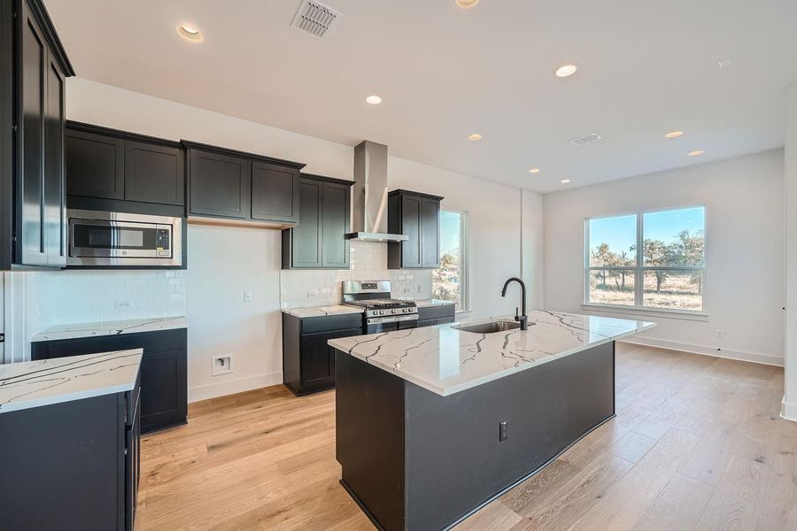 Furnished interior view inside a new home in Chester Ranch Place, Round Rock (Image 11).
