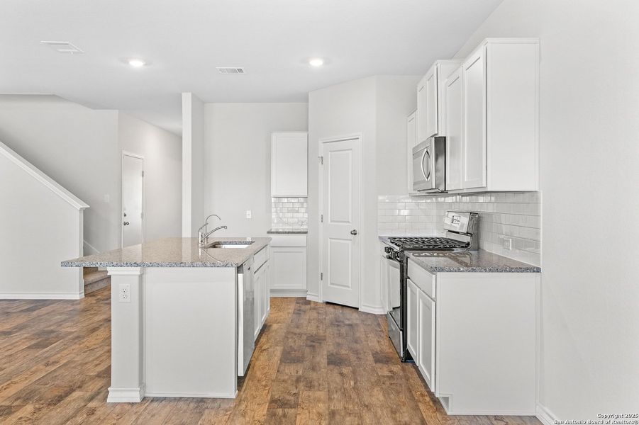 Furnished interior view inside a new home in Brookstone Creek, San Antonio (Image 6).
