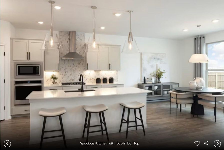 Interior photos- Photo of Pulte model home with same floor plan, not of actual home listed.