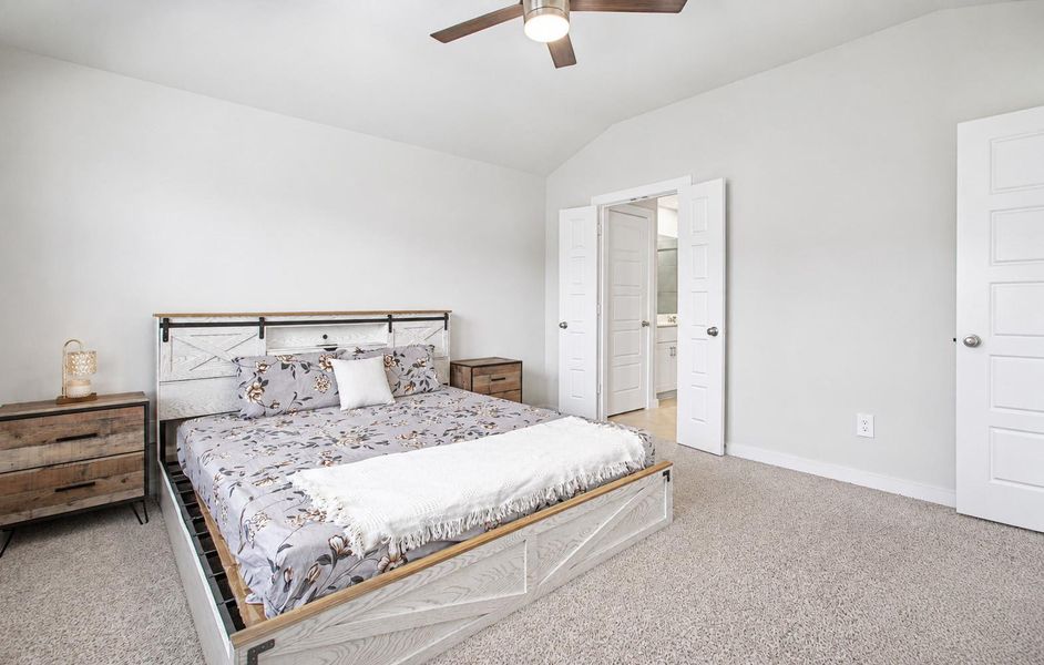 The primary bedroom provides room for a complete bedroom set while still allowing room to move around. The primary bedroom provides room for a complete bedroom set while still allowing room to move around.