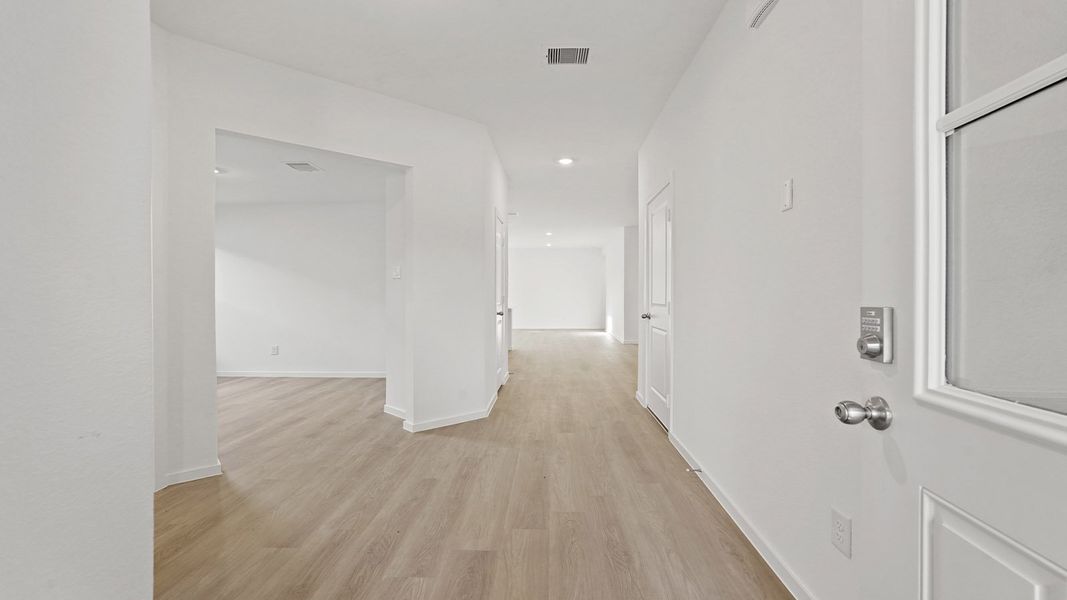 Representative unfurnished interior of a home built from the Lakeway by D.R. Horton in New Waverly Station, New Waverly (Image 12).