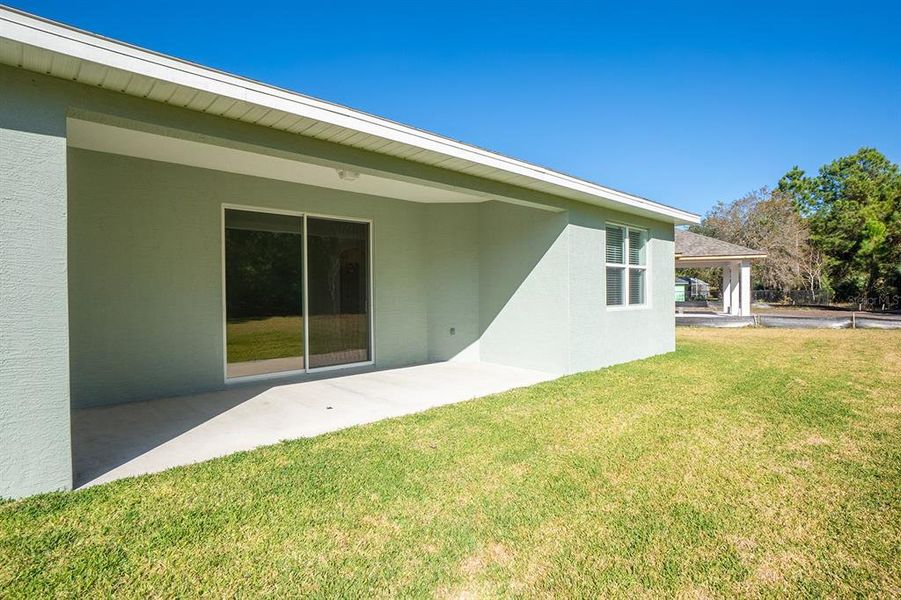 Exterior details and patio area of a home in , Palm Coast (Image 30).