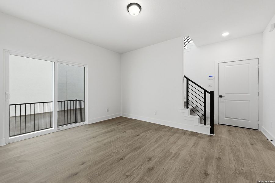 Spacious, unfurnished interior of a new home in Centero at Stone Oak, San Antonio (Image 13).
