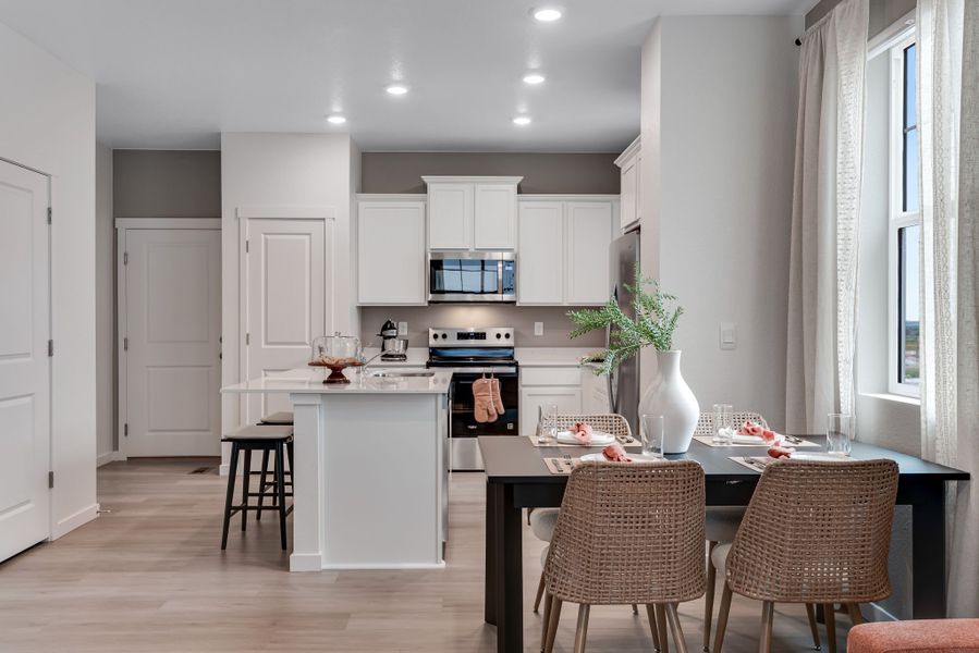 Representative furnished interior of a home built from the AUGUSTA by D.R. Horton in Vista Meadows, Fort Lupton (Image 7).